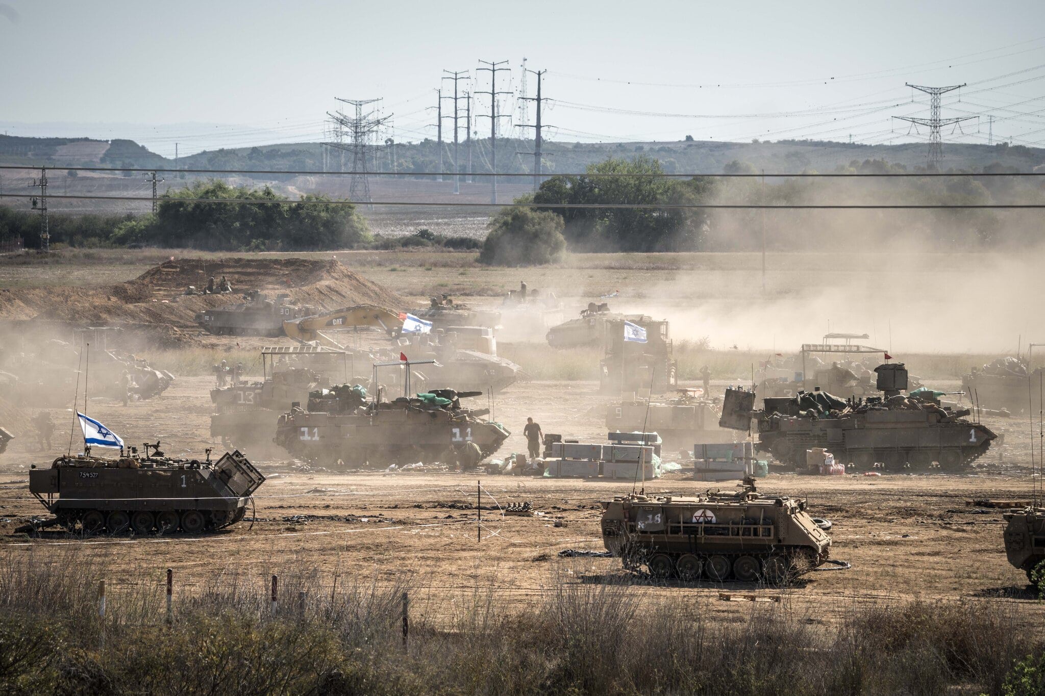 Israeli military vehicles near the Gaza Strip this week.Credit...Sergey Ponomarev for The New York Times
