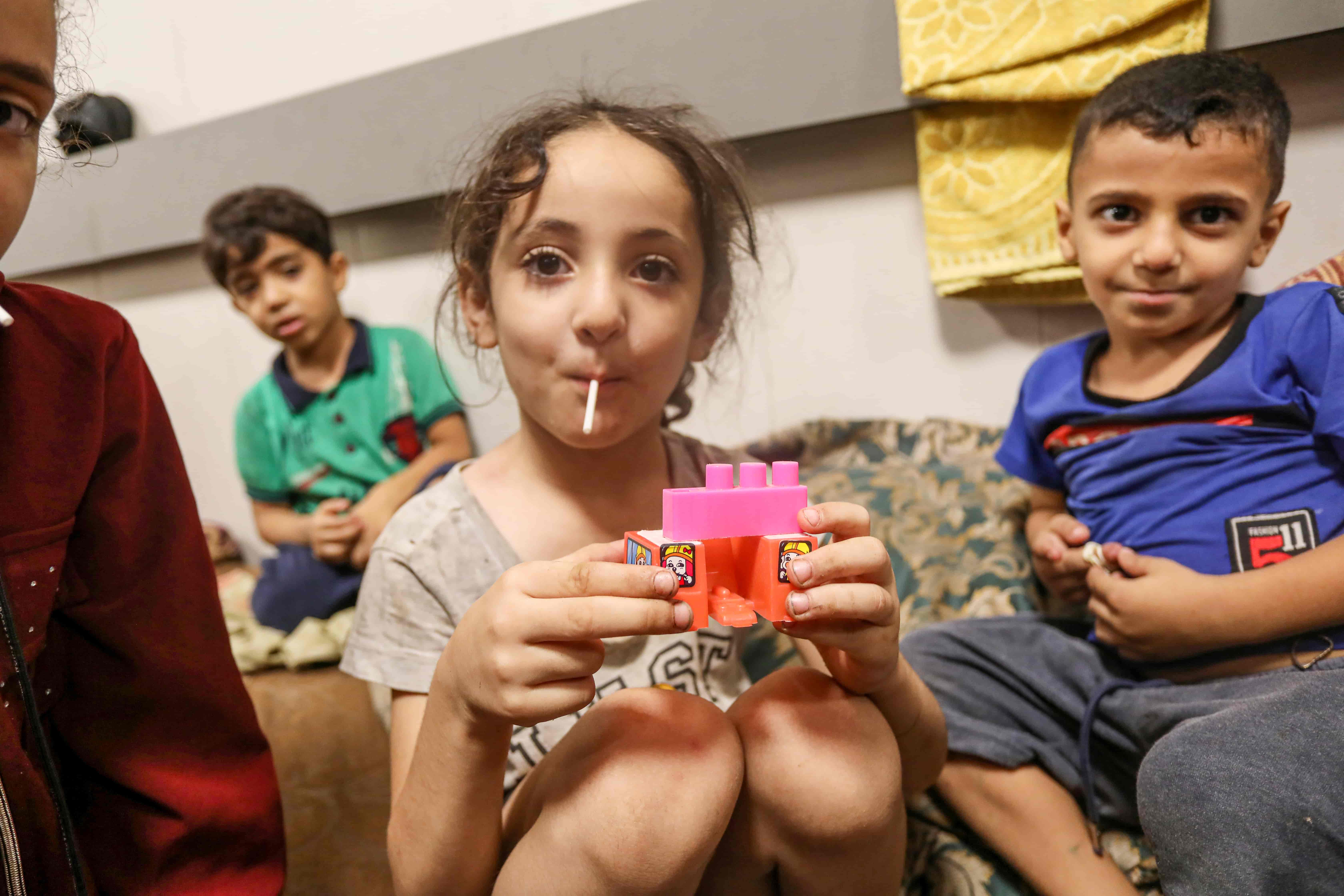 Children make up almost half of the Gaza Strip's 2.3 million population [Abdelhakim Abu Riash/Al Jazeera]
