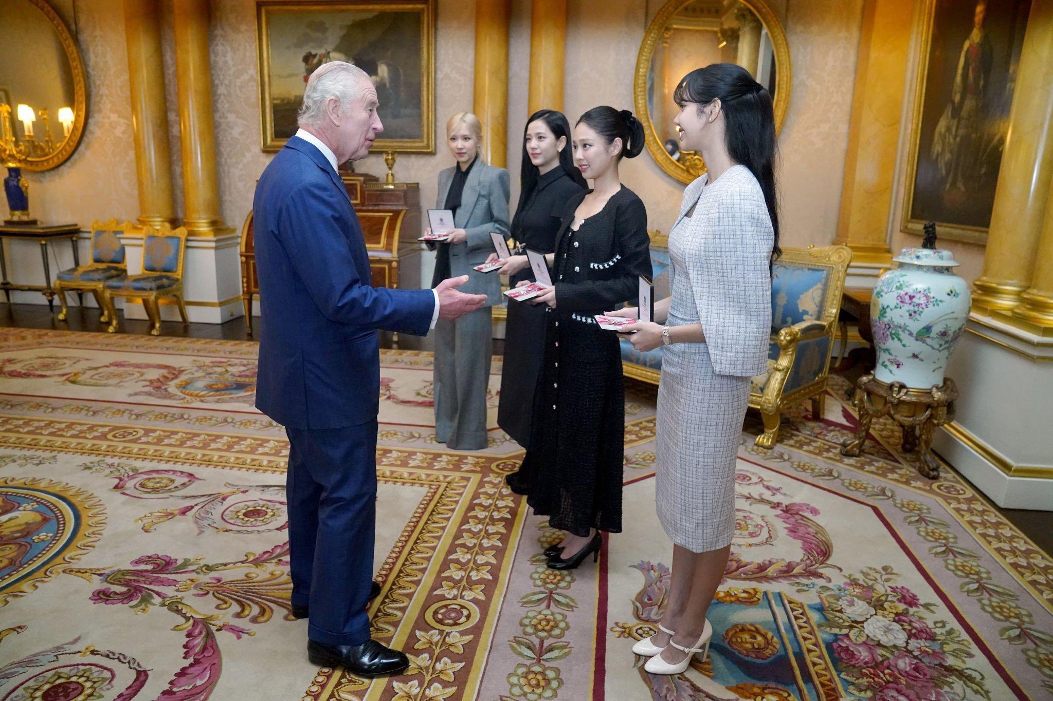 King Charles III chatted with the group at their investiture on Wednesday. AP