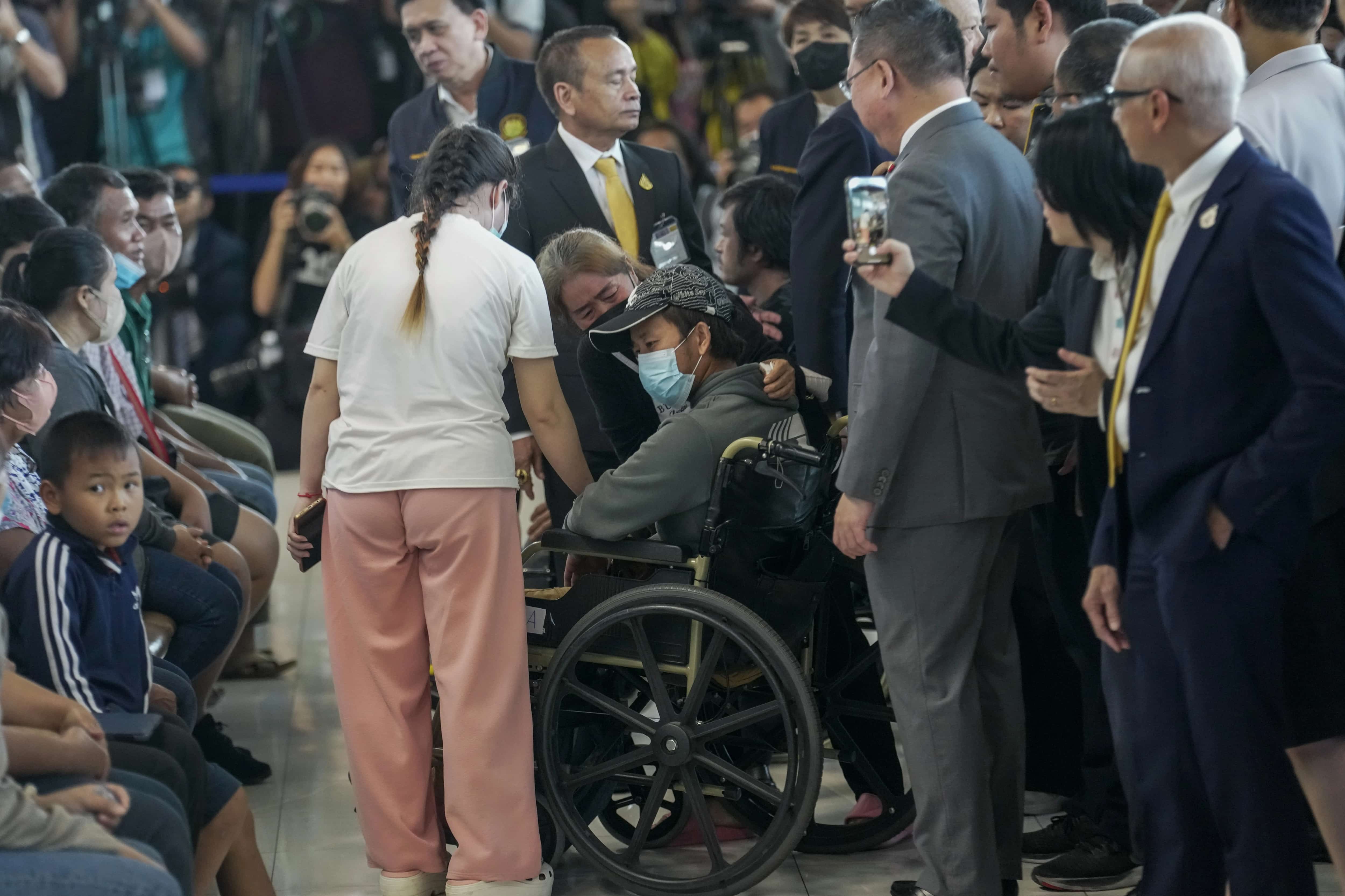 Copyright 2023 The Associated Press. All rights reserved.  An injured Thai overseas worker, on wheelchair, who was evacuated from Israel, arrives at Suvarnabhumi International Airport, in Samut Prakarn Province, Thailand, Thursday, Oct. 12, 2023. The first Thai nationals evacuated since the latest war between Israel and Hamas returned home Thursday. (AP Photo/Sakchai Lalit)