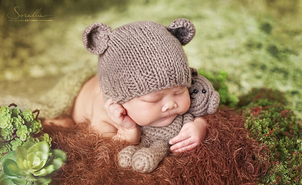 newborn hug a bear